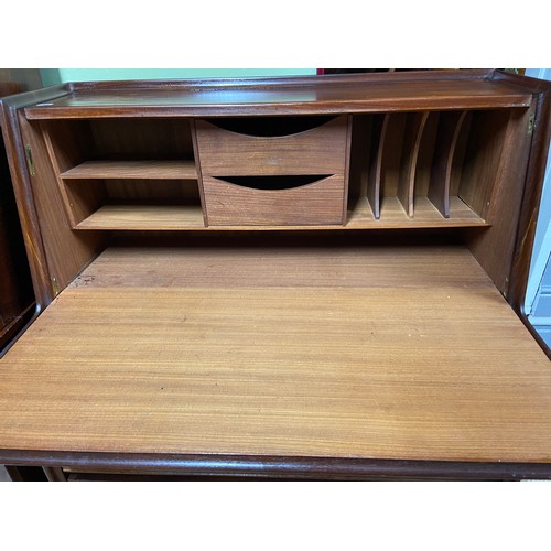 422A - A Mid century three drawer pedestal leg writing bureau.