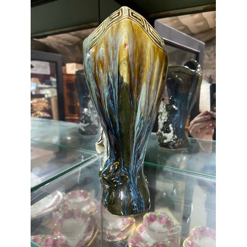 120C - A Chinese drip glaze vase designed with mother and child raised relief figures.