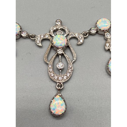 49 - An Impressive silver and opal Belle Epoque style necklace.