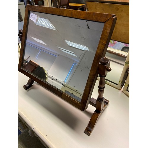 182 - A Georgian mahogany framed shaving mirror.