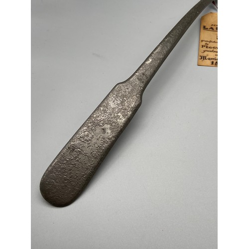 109 - An early 18th century large pewter ladle, Comes with original gift tag, 'Pewter Ladle given by Wm Wa... 