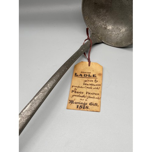 109 - An early 18th century large pewter ladle, Comes with original gift tag, 'Pewter Ladle given by Wm Wa... 