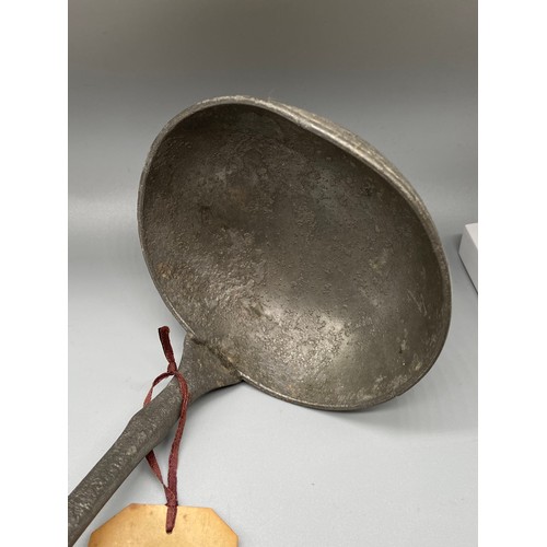 109 - An early 18th century large pewter ladle, Comes with original gift tag, 'Pewter Ladle given by Wm Wa... 