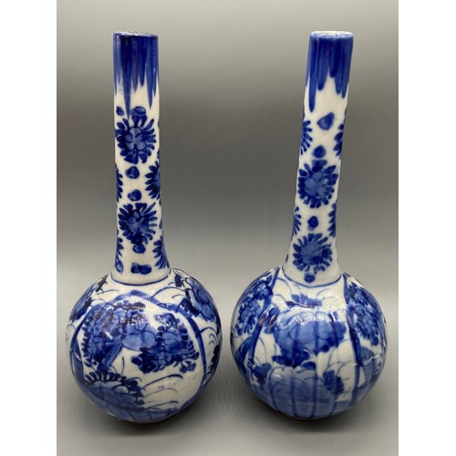 133 - A Pair of Chinese 20th century blue and white long neck vases. [