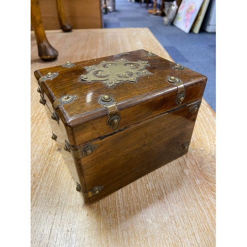 238 - A Victorian brass bound tea caddy