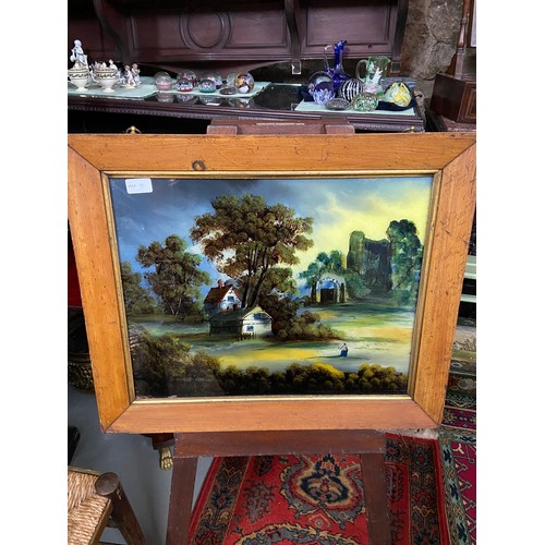 98A - A 19th century painting on glass depicting ruins and landscape.