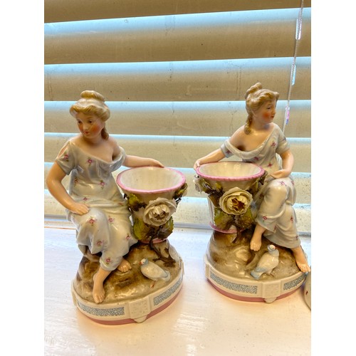 587 - A Pair of Staffordshire wally dogs and a pair of Meissen style lady figurines