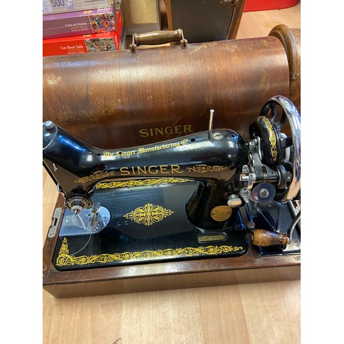 537 - Two antique Singer sewing machines within fitted carry cases.