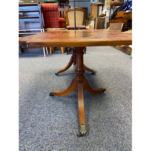 534 - An Antique style leather top lounge table