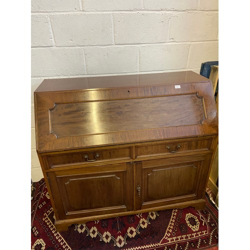 73D - An 18th/ 19th century large writing bureau. Finished with a green leather writing area and storage c... 