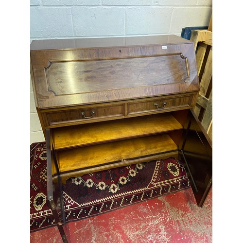 73D - An 18th/ 19th century large writing bureau. Finished with a green leather writing area and storage c... 