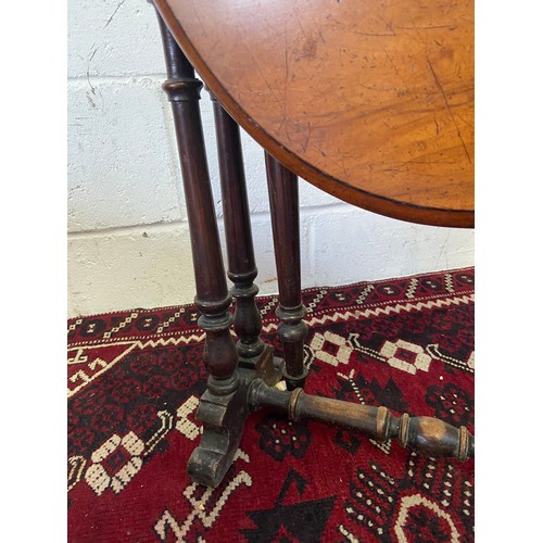 69A - A Victorian period walnut Yacht
Table or Sutherland with turned
supports. [H:58cm x L:72cm x W:52cm]