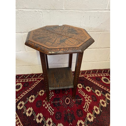 22B - A 19th century Jacobean style hand carved two tier side table.[ Standing 73cm high and 53cm in width... 