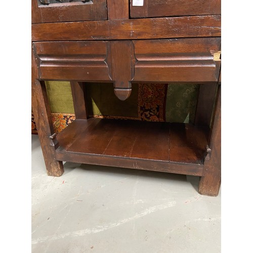 106B - A 17th century style oak buffet cupboard. Designed with two carved panel doors and single under draw... 