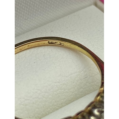 30J - A Ladies gold [Rubbed mark] five stone ring. [2.10grams] [Ring size P]