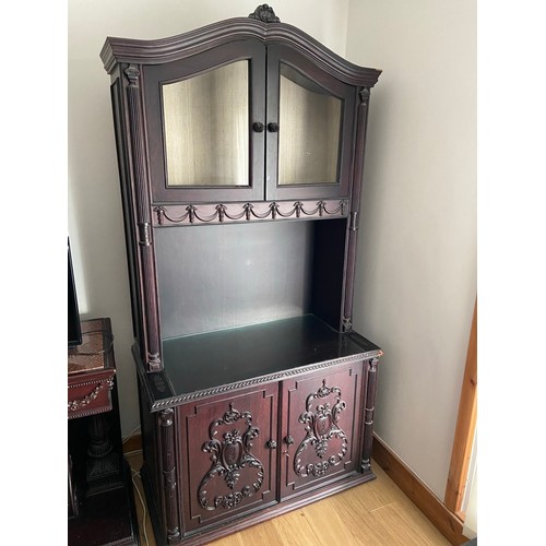 455C - A Large Indian Rose wood display cabinet. Designed with ornate door panels, trims and finials. [223x... 