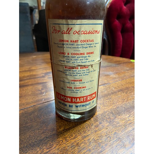 382B - A Very old bottling of Lemon Hart Rum. The Golden Spirit. 70proof. Still sealed.