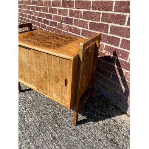 324W - A Retro pedestal two door record cabinet.