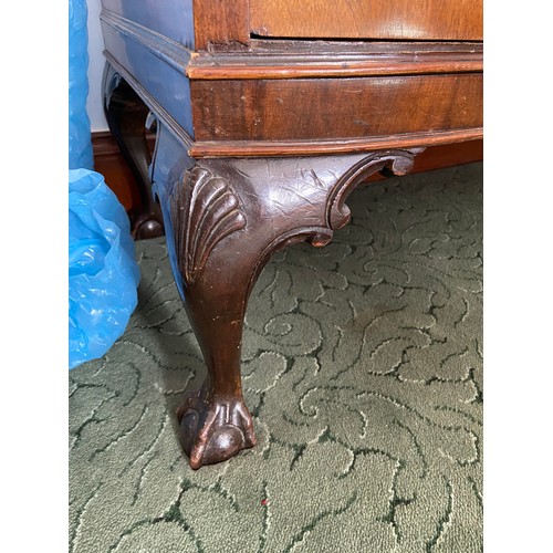 316W - An Antique Burr Walnut sideboard designed with three drawers and two doors. Finished with ball and c... 