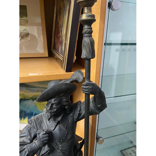 20 - A Victorian Spelter Cavalier figurine table lamp. Designed holding a lance which is topped by the et... 