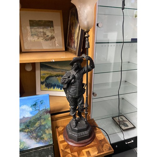 20 - A Victorian Spelter Cavalier figurine table lamp. Designed holding a lance which is topped by the et... 