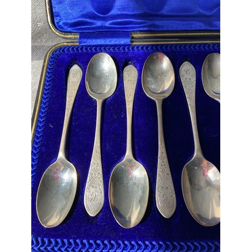 115J - A boxed set of 11 Sheffield silver teaspoons & sugar tongs produced [Sutherland & Roden] [188g]