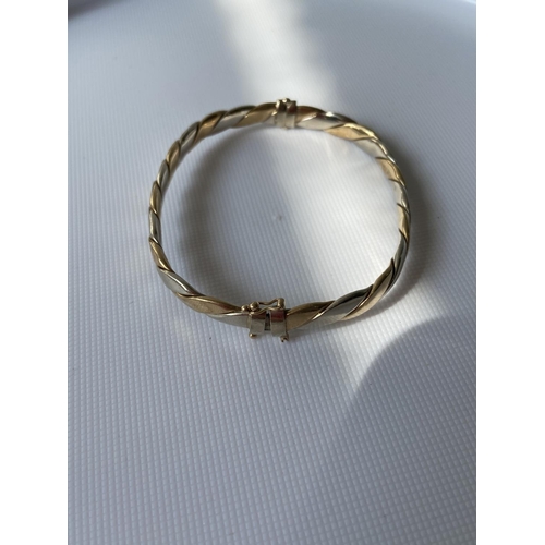 60J - A London export 9ct gold two tone bangle (missing clasp) [5x5cm] [10-25g]