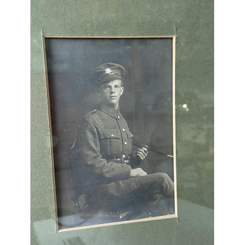 192J - A Framed WWI War & Victory medals with photograph of officer. Medals belong to 74571 PTE. J. E. P. W... 