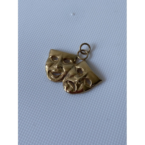 40J - 9ct gold double theatre mask pendant [3.81g]