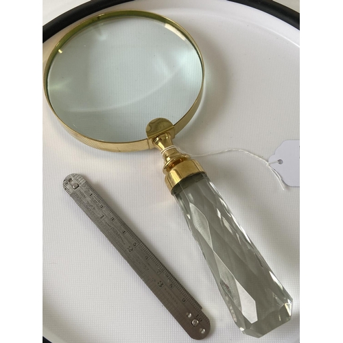 83J - A large Brass cased magnifying glass. [22cm in length]