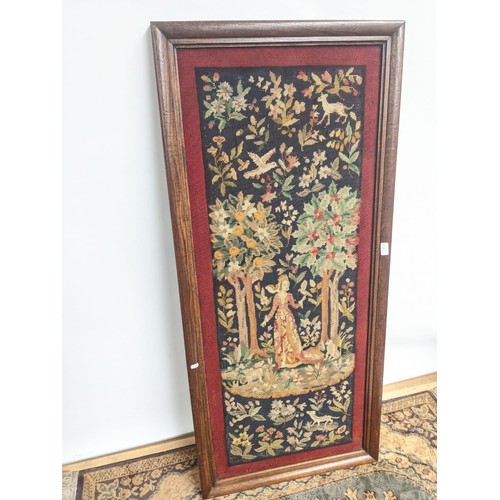 5 - A 19th century rectangular oak framed tapestry, telling the story of a lady of importance surrounded... 