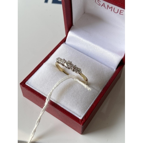 15J - An 18ct gold ladies ring set with 5 brilliant white diamonds [1 inclusion] [size T] [2.73g]