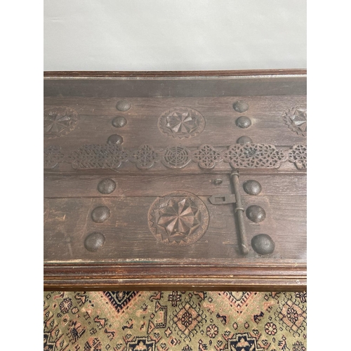 18 - An original Saudi Arabia door made into a coffee table. [41x120x52cm]