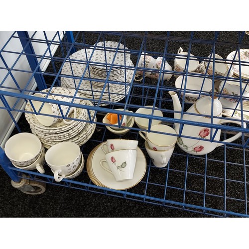 431 - A Trolley containing a collection of porcelain wares to include Bretby art deco vase, Austrian antel... 