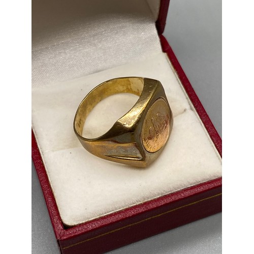 84J - A Gent's 9ct gold ring set with a 1945 Mexican 2 Pesos Gold Coin. [Ring size T] [7.00grams]