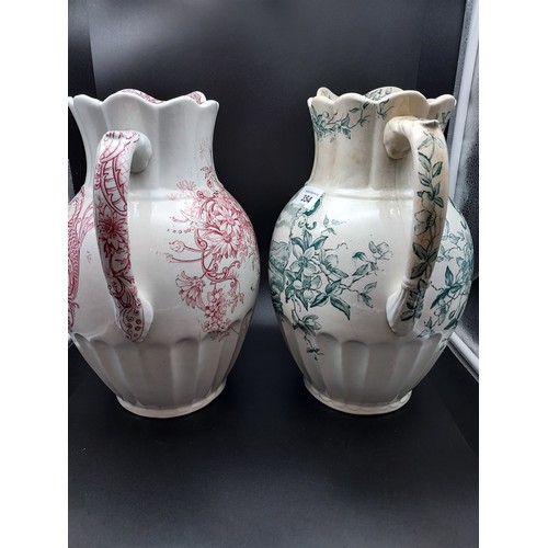 354 - Two Antique porcelain water jugs produced by D. M. & Sons. 'Clarence & Lomond patterns'