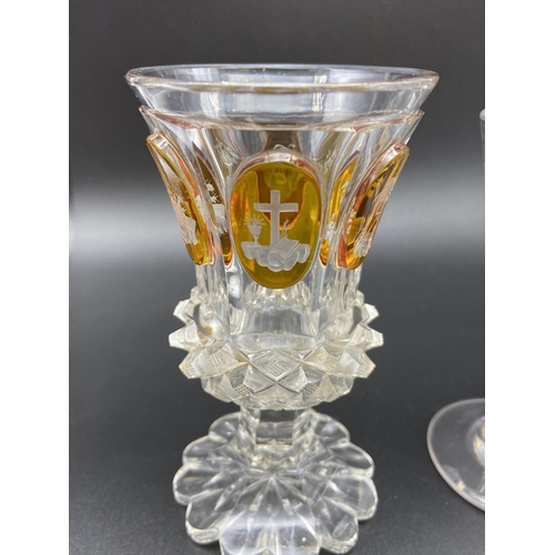 153 - A Lot of four antique and vintage cut glass drinking glasses. Includes Bohemian orange tinted and et... 