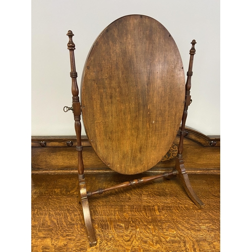 73 - A 19th century mahogany framed dressing table mirror  with turned column support. [68cm in height]