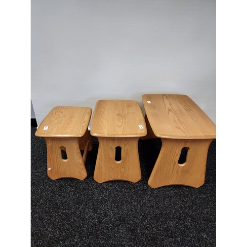 204 - A Set of three Light Elm Wood Windsor Ercol tables [Nest] [45x63x41cm]