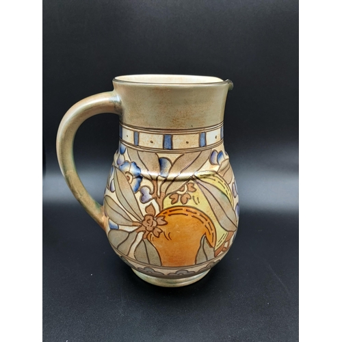 316 - Charlotte Rhead Bursley Ware Autumn pattern water jug. [19cm in height]