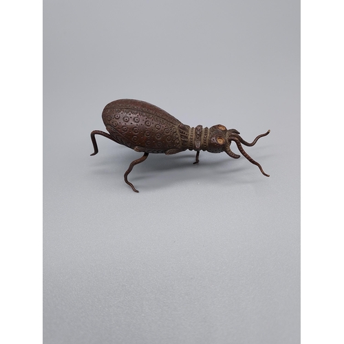 52J - A 19th century [possibly earlier] Far Eastern Bronze sculpture of a beetle. [2.5x6.5x2cm]