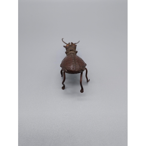 52J - A 19th century [possibly earlier] Far Eastern Bronze sculpture of a beetle. [2.5x6.5x2cm]