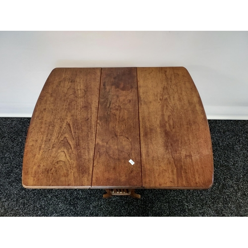 253 - An antique mahogany Sutherland drop leaf table, supported on twin pierced supports [64x60x77cm]