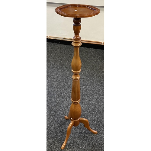 118 - A Reproduction torcher stand. [126cm]