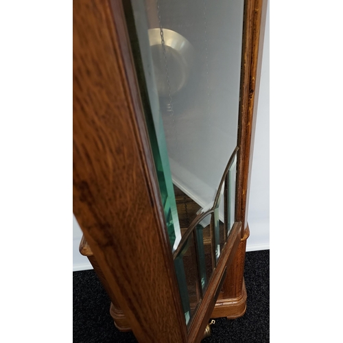 58 - An oak cased Grandfather clock, with hand carved foliage design to the upper section, silver and gol... 