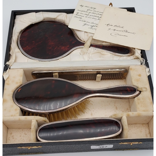 529 - An Antique London silver and tortoise shell dressing table set with a fitted travel box.