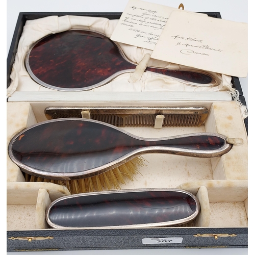 529 - An Antique London silver and tortoise shell dressing table set with a fitted travel box.