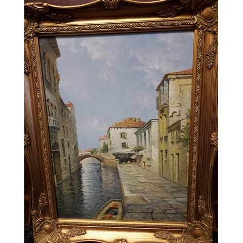 149 - A Lot of two oil paintings on canvas, depicting Venice canal and building scene signed J Leyland and... 