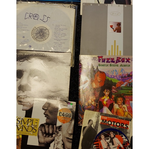 180 - A Collection of mixed records to include Sex Pistols, Simple Minds, The Motors, Fuzzbox, The Jam, Sq... 