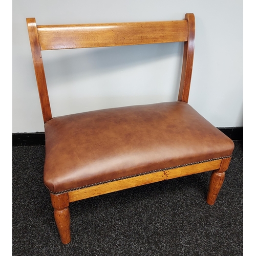 186 - A 19th century window two seat loving chair. Reupholstered in brown leather [80x76x30cm]